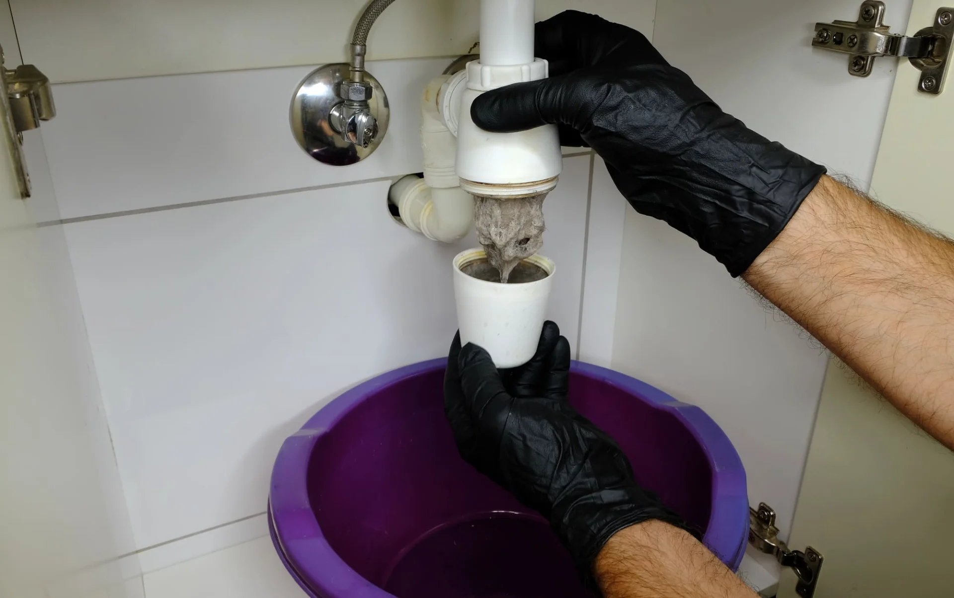 Drain cleaning service technician